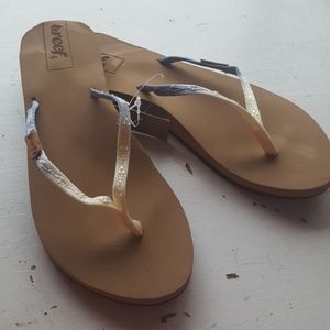 Reef brown flip flops with blue and white straps